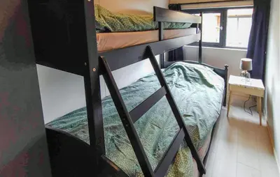 a couple of bunk beds in a room at Amazing Apartment In Bjorli in Bjorli