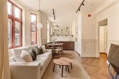 a living room with a couch and a table at F7 l Architects Choice in Bergen