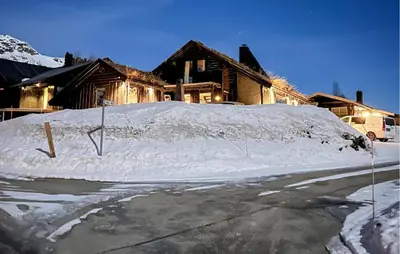a pile of snow in front of a house at Pet Friendly Home In Hovden I Setesdal in Hovden