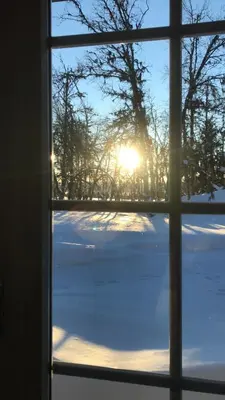 a window with a view of a snow covered yard at Timber Cabin With Views Over Golsfjellet in Gol