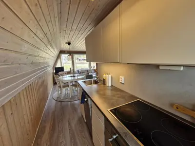 a kitchen with a sink and a counter top at Fjellhytte i Valdres, rett ved nasjonalpark og turstier in Robøle