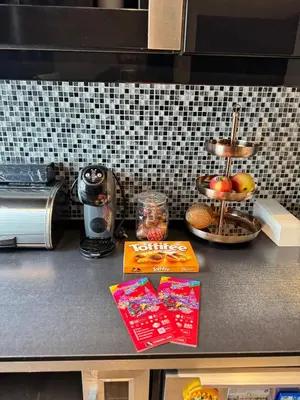 a counter top with some food on top of it at CozyStay Beside Historic Bryggen in Bergen