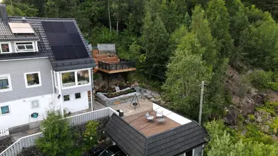an aerial view of a house with solar panels on its roof at Morgensolen in Bergen