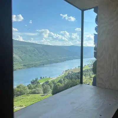 Architect designed sleeping box in barn