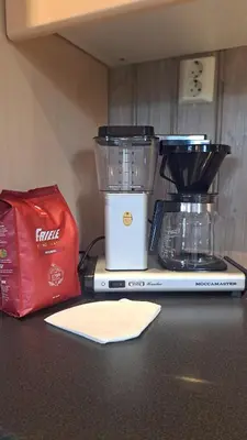 a counter with a blender and a red bag on it at Cozy Cottage in Rauland Vierli in Torvetjørn