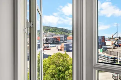 a view of a city from a window at Historic Bergen Home I Free Parking in Bergen