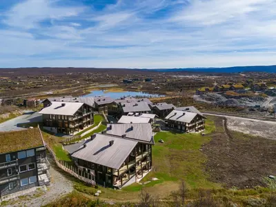 an aerial view of a large house at Kikut Alpin Lodge 1301 in Hol