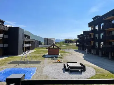 a view of a courtyard of a building at Helgatunlia - Leilighet 2 in Vossevangen