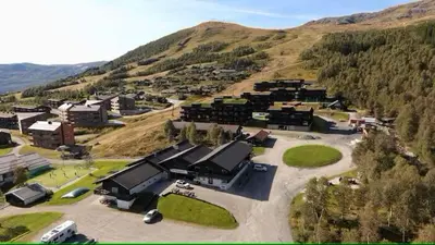 an aerial view of a village in a mountain at Helgatunlia - Leilighet 2 in Vossevangen