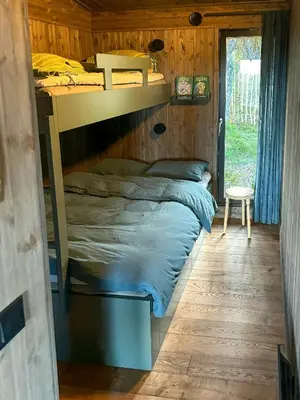 a bedroom with a bunk bed in a cabin at Modern Cabin By The Ski Trails At Fagerhøy in Sør-Fron