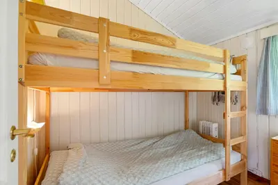 a couple of bunk beds in a room at Mountain Base For Active Explorers in Oppdal