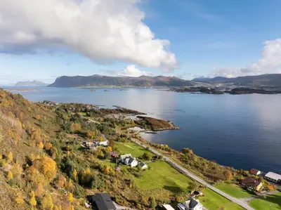an aerial view of a large body of water at Torvika Seaview Pods in Bølandet