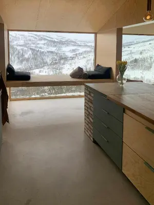 a room with a large window with a view at Unique, Modern Cabin With A Stunning View in Sogndal
