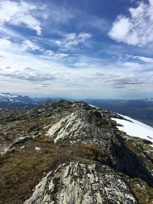 a view of the top of a mountain with snow at Charming farmhouse with jacuzzi and patio in Stryn