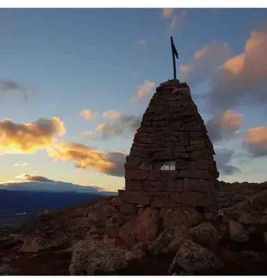 a cross on the top of a mountain at Holiday cabin, Kristianplass at Bjorli, Lesja in Bjorli