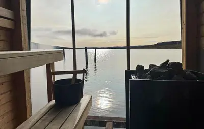 a view of the water from a window with a bucket at Awesome Home In Vøringsfoss With Sauna in Maurset