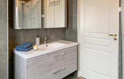 a bathroom with a sink and a mirror at Stunning Home In Bjorli With Wifi in Bjorli