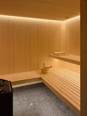 a sauna with a wooden bench in a room at Timber Cabin By The Ski Slopes In Oppdal in Oppdal