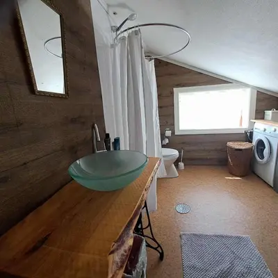 a bathroom with a green sink and a toilet at xxx in Ryfoss