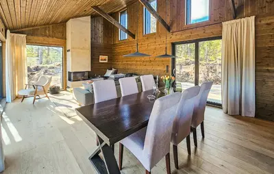 a dining room with a table and chairs at 4 Bedroom Stunning Home In Eggedal in Eggedal