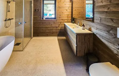 a bathroom with two sinks and a tub and a mirror at 4 Bedroom Stunning Home In Eggedal in Eggedal