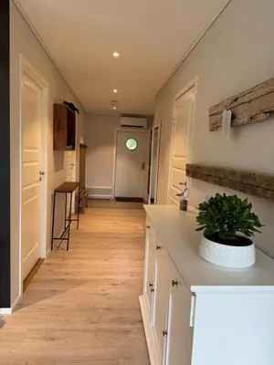 a hallway of a home with a kitchen with a counter at Loen Panorama View in Loen