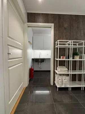 a small kitchen with a sink and a sink at Loen Panorama View in Loen