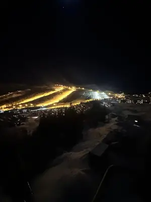 a view of a parking lot at night at Ski in-ski out leilighet Hemsedal in Fausko
