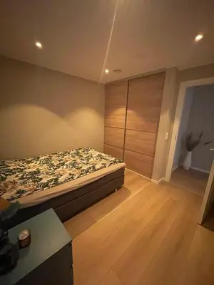 a bedroom with a bed in a room at Daniels House in Kristiansund