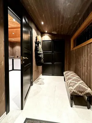 a room with a hallway with a bed in it at Nature-Close Cabin By Trysil Mountain in Trysil