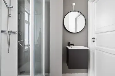 a bathroom with a sink and a mirror at Bergen Beds Apartments - Unbeatable location! in Bergen