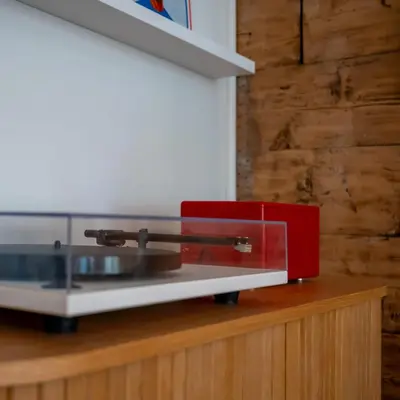 a microwave on a counter with a red box on it at Authentic Bergen Apartment in Bergen