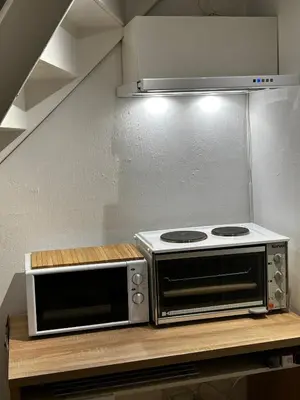 two microwaves sitting on a counter in a kitchen at Lade - Aqua Nor 2025 - inntil 7 personer in Lii