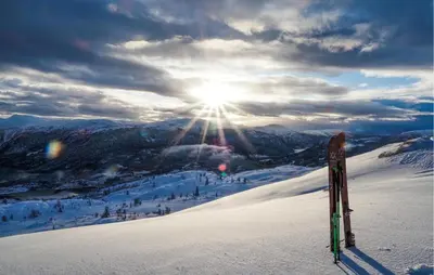 a view of a ski slope with the sun in the sky at Nice Home In Hafslo With Wifi in Hafslo
