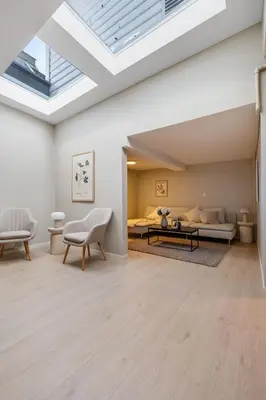 a living room with a skylight in the ceiling at Central stay apartment - 201 in Bergen