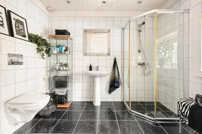a bathroom with a shower and a sink and a toilet at Traditional Norwegian Villa, Bay view and boat in Bergen