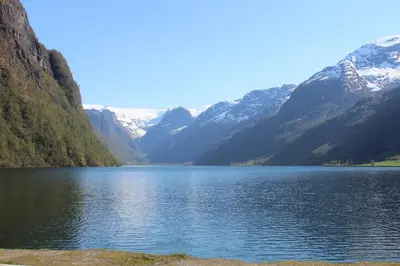 a view of a lake with mountains in the background at Olden Tinyhouse - Modern Living in Olden