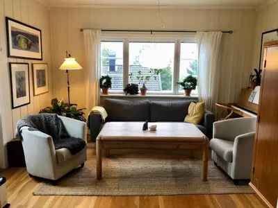 a living room with a couch and a coffee table at 6 person holiday home in Lillehammer in Lillehammer