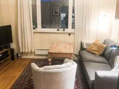 a living room with a couch and a coffee table at 6 person holiday home in Lillehammer in Lillehammer