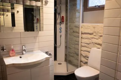 a bathroom with a sink and a shower at Private Apartment in Bergen in Bergen