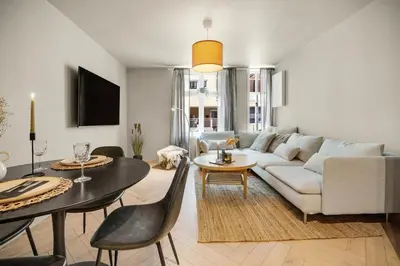 a living room with a couch and a table at Central apt in the centre of Bergen in Bergen