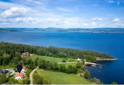an aerial view of a large body of water at Helgøya Hideaway