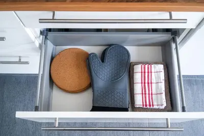 a drawer in a refrigerator with a cookie and towels at The Oak Courtyard