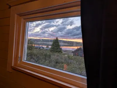 a window in a room with a view at Nordseter Sjusjøen fiske, jakt, tur og ski in Lillehammer