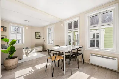 a dining room with a table and chairs at Charming Townhouse - Walk Everywhere! in Bergen