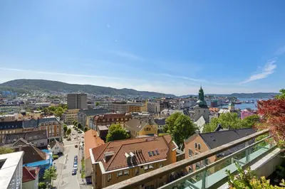 a view of a city with buildings and a street at Central Bergen apt w Balcony in Bergen