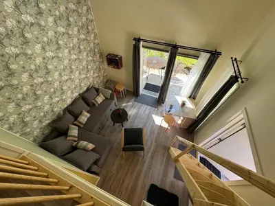 an overhead view of a living room with a couch at Flåm Tinyhouse with a Waterfall View in Flåm