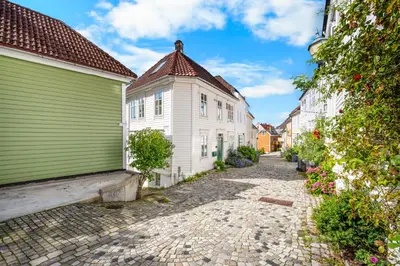 an alley in a city with buildings at Bergen Charm - Right in the City Center! in Bergen