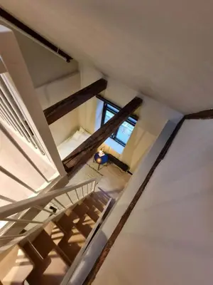 an overhead view of a staircase in a house at Central and Spacious Apartment for 8 in Trondheim