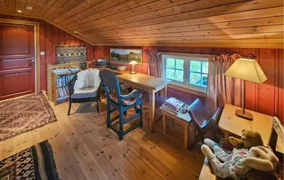 an overhead view of a room with a desk in a tiny house at Amazing Home In Eggedal With Sauna in Eggedal